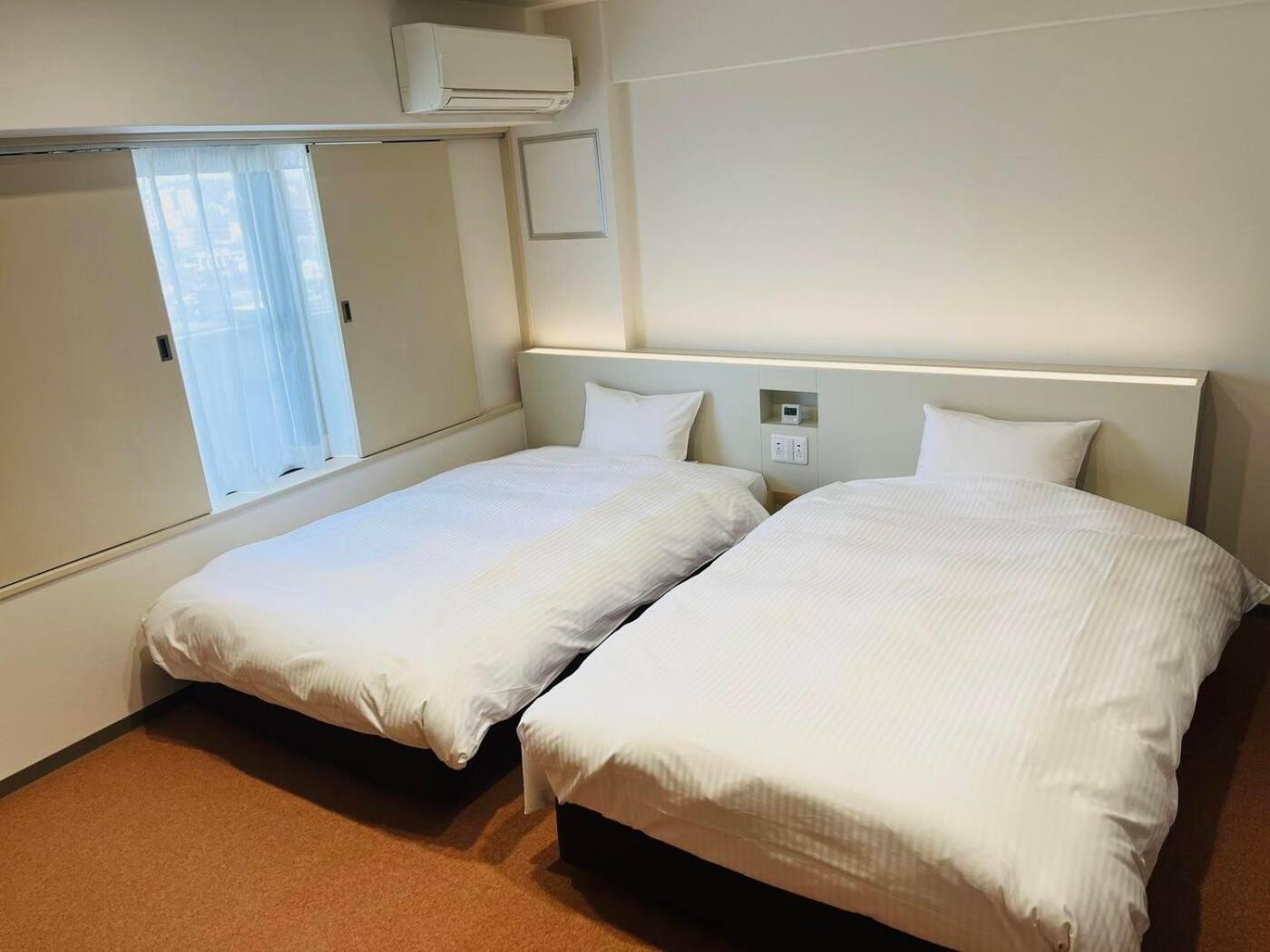 Hotel Alpha Inn Акита Стая снимка