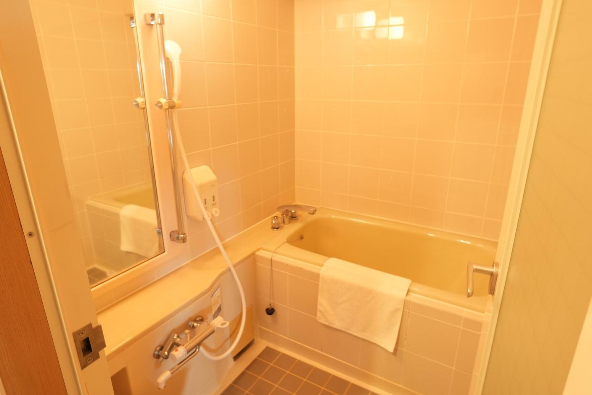 Hotel Alpha Inn Акита Екстериор снимка