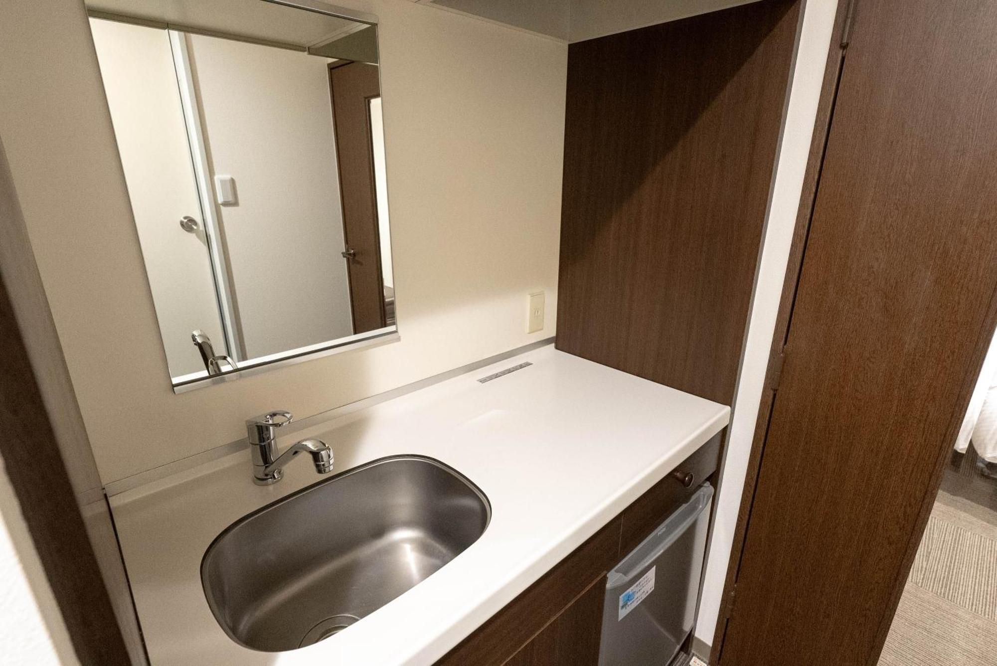 Hotel Alpha Inn Акита Стая снимка