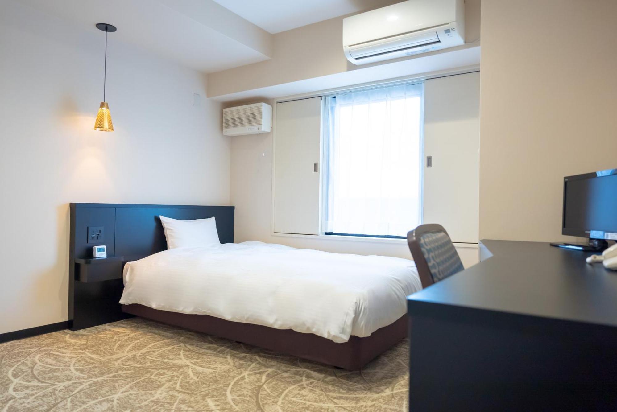Hotel Alpha Inn Акита Стая снимка
