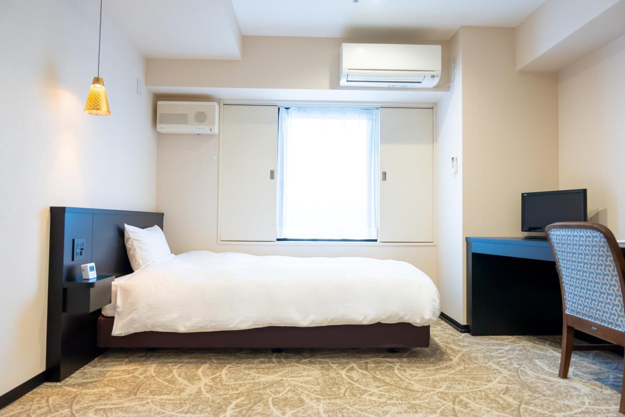 Hotel Alpha Inn Акита Стая снимка